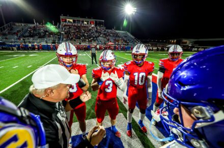 Football players with Coach